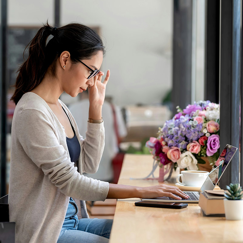 At her tall table, she immerses herself in refining AI workflows, using Microsoft Copilot Studio to automate repetitive tasks and improve efficiency across her organization.