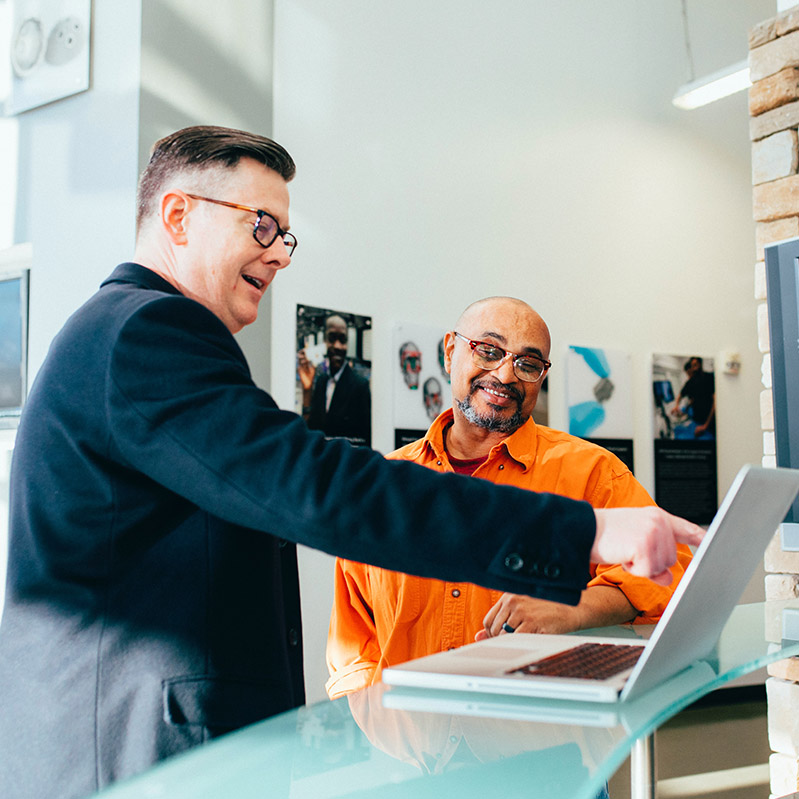 Picture of IT Security team using Microsoft Entra to monitor tenants and get personalized recommendations to strengthen organization network security 