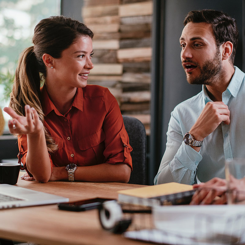 Picture of employees collaborating on a project, leveraging business applications that securely access the internet through Microsoft Entra Internet Access, fortifying the organization's Zero Trust posture with adaptive access policies and consolidated network security controls for enhanced defense.