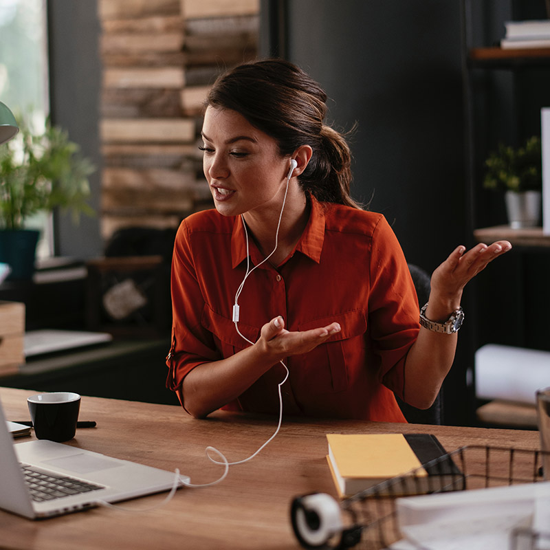 Picture of employee collaborating with her team on a project securely via Microsoft Teams, powered by Microsoft Entra Internet Access. Strengthening the organization's Zero Trust posture, the solution eliminates defense gaps with adaptive access policies and consolidated network security controls for enhanced protection.