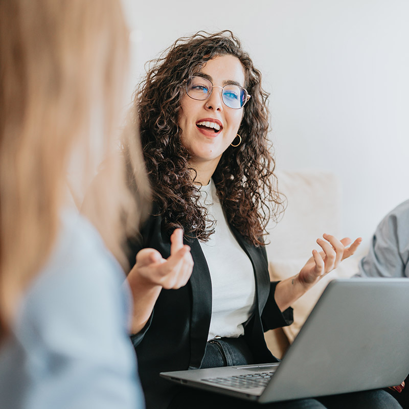 Picture of employees discussing a project with seamless access to Microsoft 365 apps, thanks to the enhanced security and productivity features provided by Microsoft Entra Internet Access, ensuring secure collaboration and efficient work from any location.